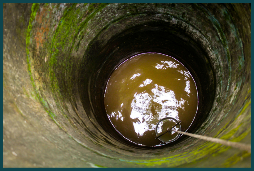 Photo of bottom of a traditional well by Omer Al Faruq via Pexels.